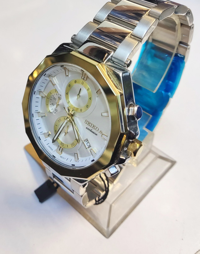 ساعت مچی مردانه SEIKO سیکو فلزی سه موتور فعال کورنوگراف بند استیل قاب طلایی استیل صفحه استیل کد 3095