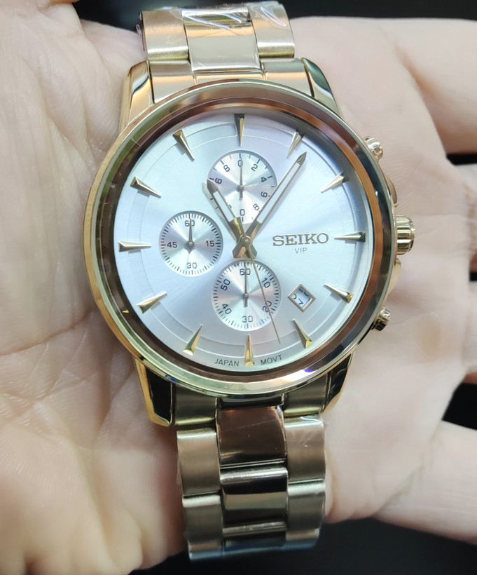 ساعت مچی مردانه SEIKO سیکو فلزی سه موتور فعال کورنوگراف بند طلایی قاب طلایی صفحه استیل دور شیشه آینه ای کد 8012