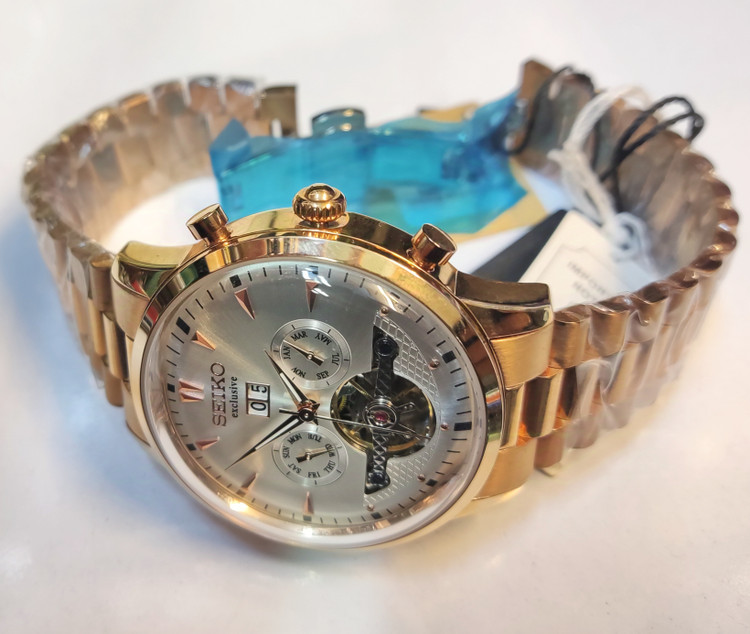 ساعت مچی مردانه SEIKO سیکو فلزی اتوماتیک مکانیکی اسکلتون درب پشت شیشه ای بند رزگلد صفحه استیل کد 3057