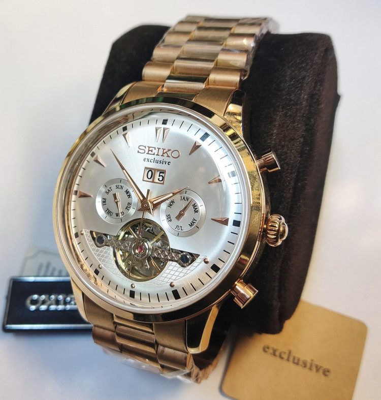 ساعت مچی مردانه SEIKO سیکو فلزی اتوماتیک مکانیکی اسکلتون درب پشت شیشه ای بند رزگلد صفحه استیل کد 3057