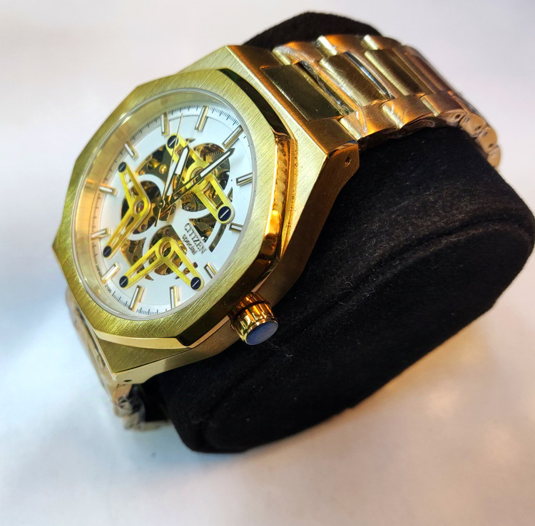 ساعت مچی مردانه CITIZEN سیتیزن فلزی اتوماتیک مکانیکی اسکلتون درب پشت شیشه ای بند طلایی صفحه سفید کد ۲۱۹۶