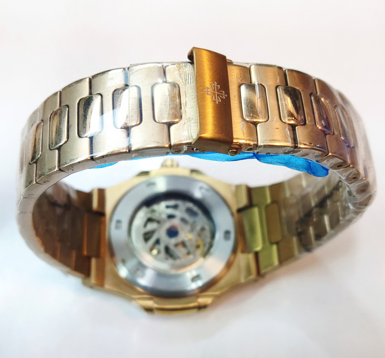 ساعت مچی مردانه PATEK PHILIPPE پتک فیلیپ ناتیلوس فلزی اتوماتیک مکانیکی اسکلتون موتور پیدا درب پشت شیشه ای بند و قاب رزگلد صفحه مشکی کد A38EAP